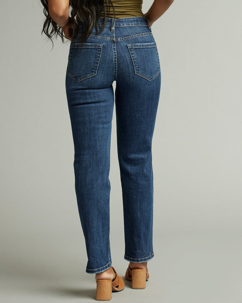 Woman in mid-rise straight jeans