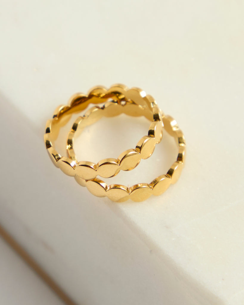 Set of two gold rings with circle design