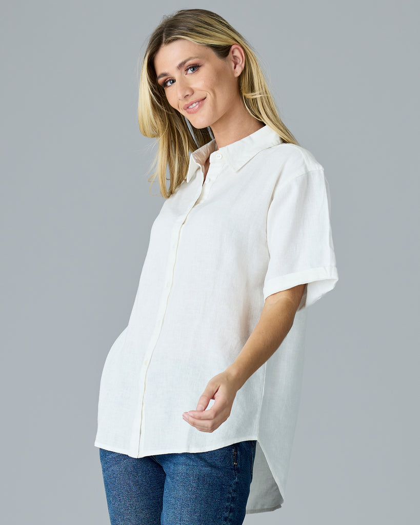 Woman in a white short sleeve button-down