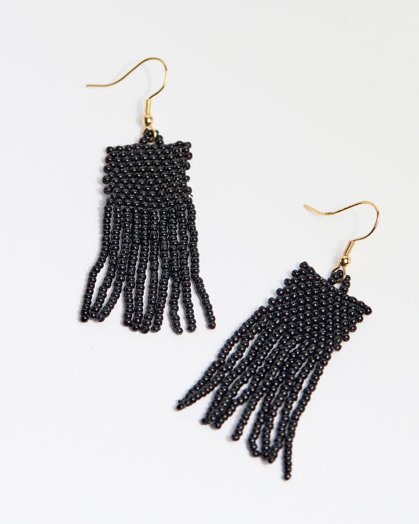 A pair of black beaded fringe earrings.