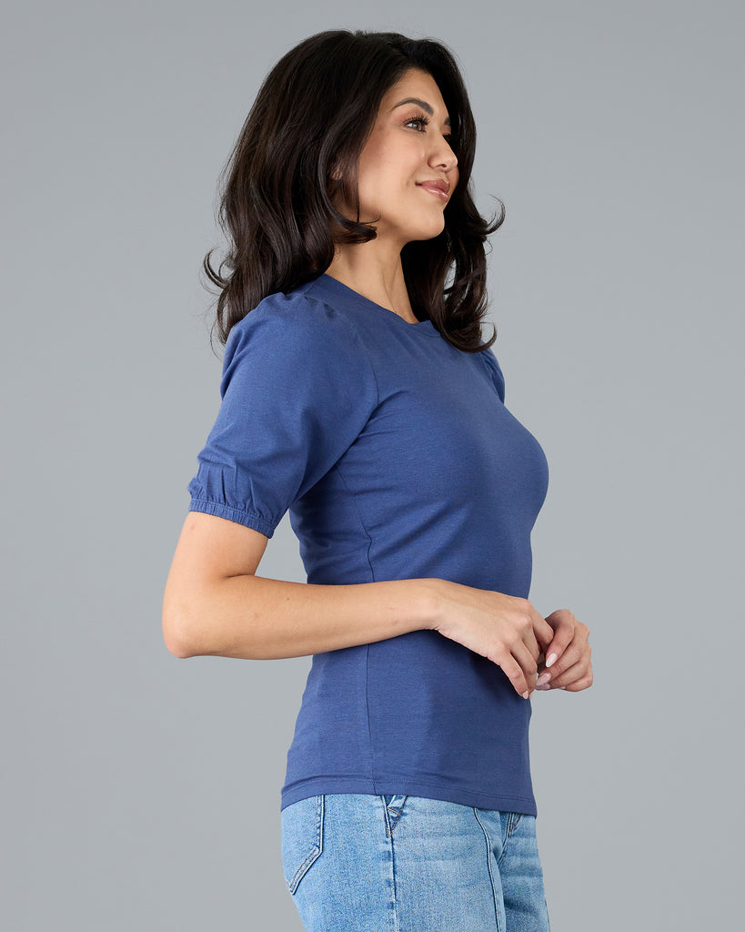 Woman in blue short sleeved tee