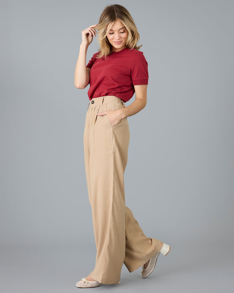 Woman in beige trousers