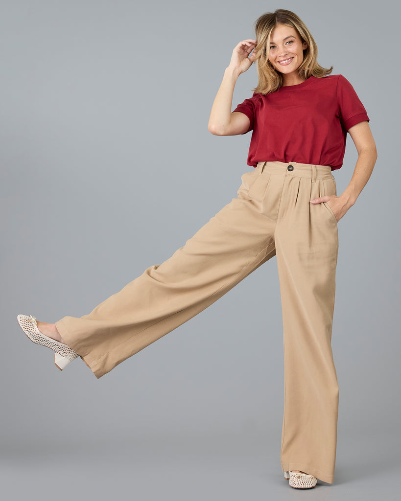 Woman in beige trousers