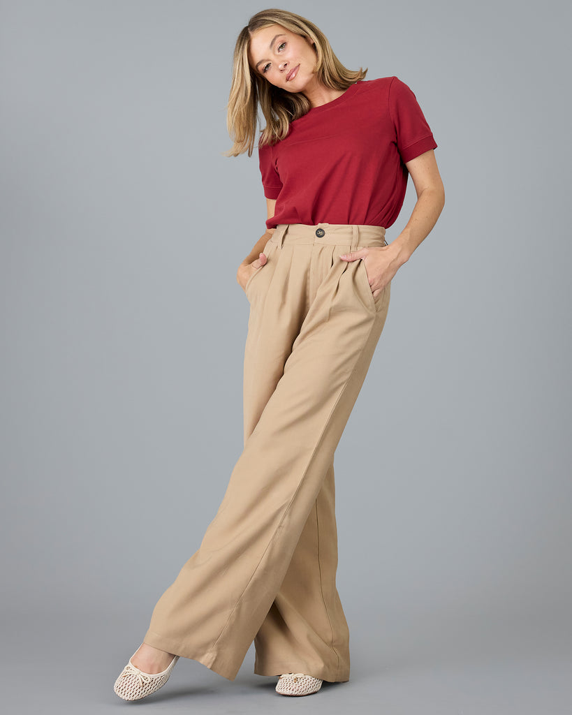 Woman in beige trousers