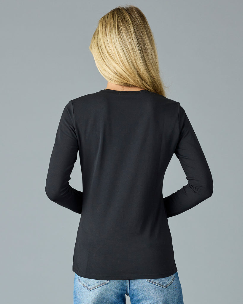 Woman in a black long sleeve basic tee