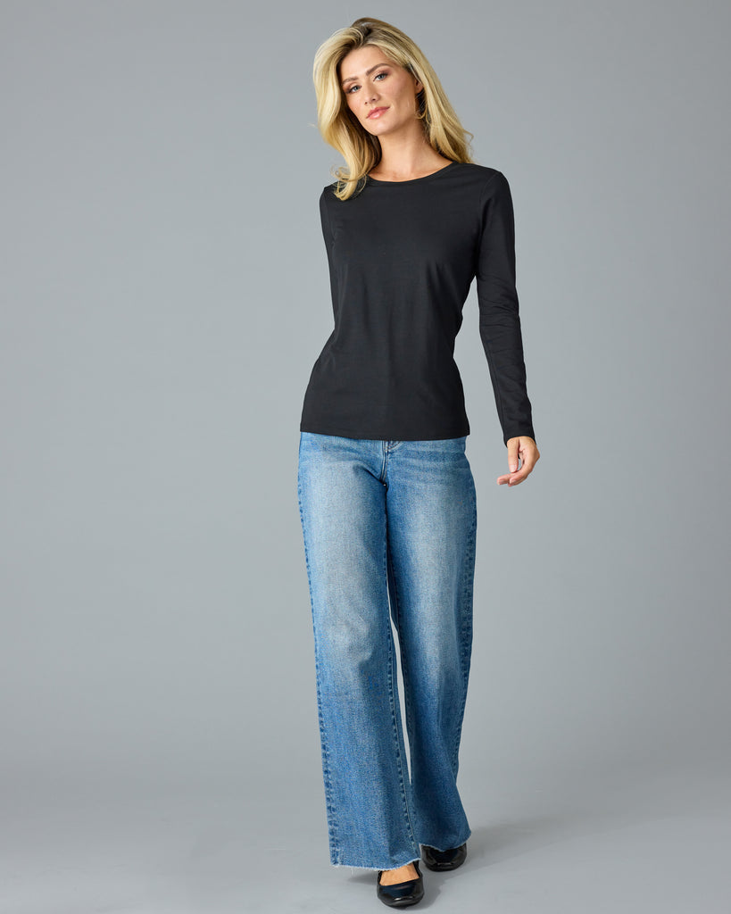 Woman in a black long sleeve basic tee