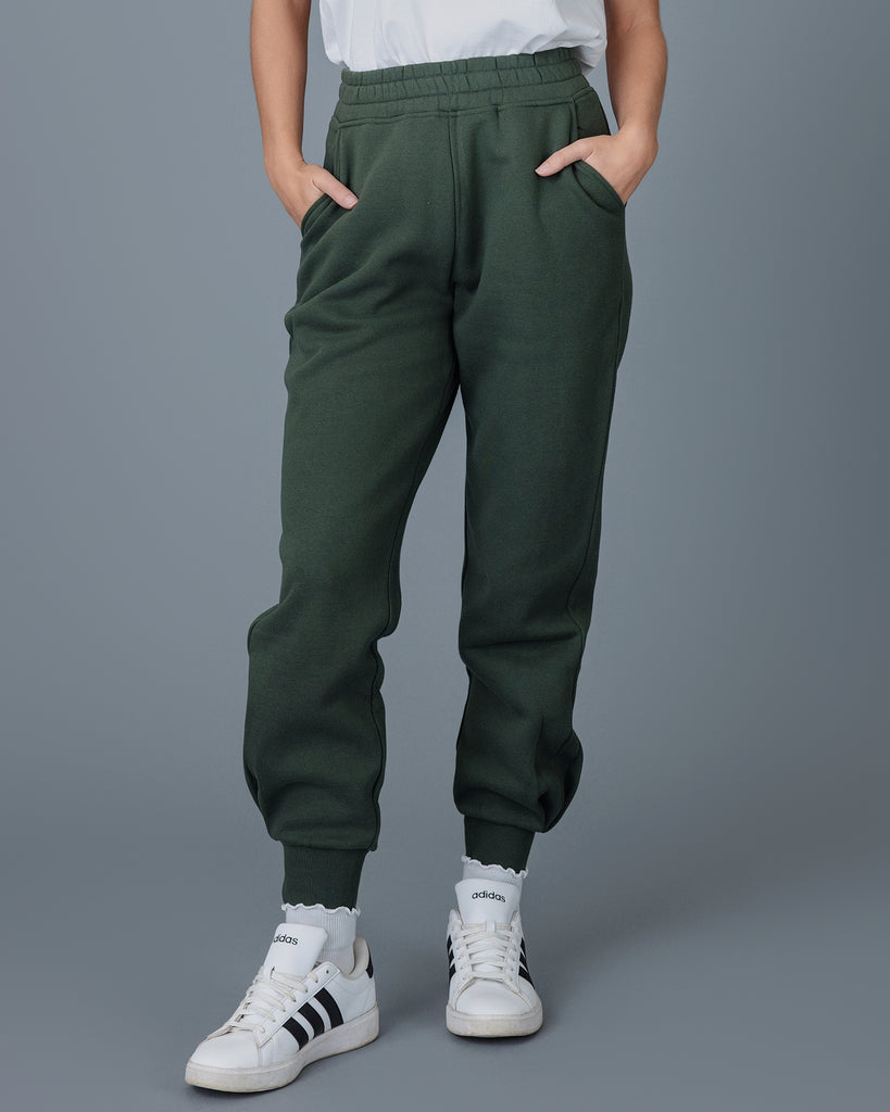 Woman in green jogger sweatpants