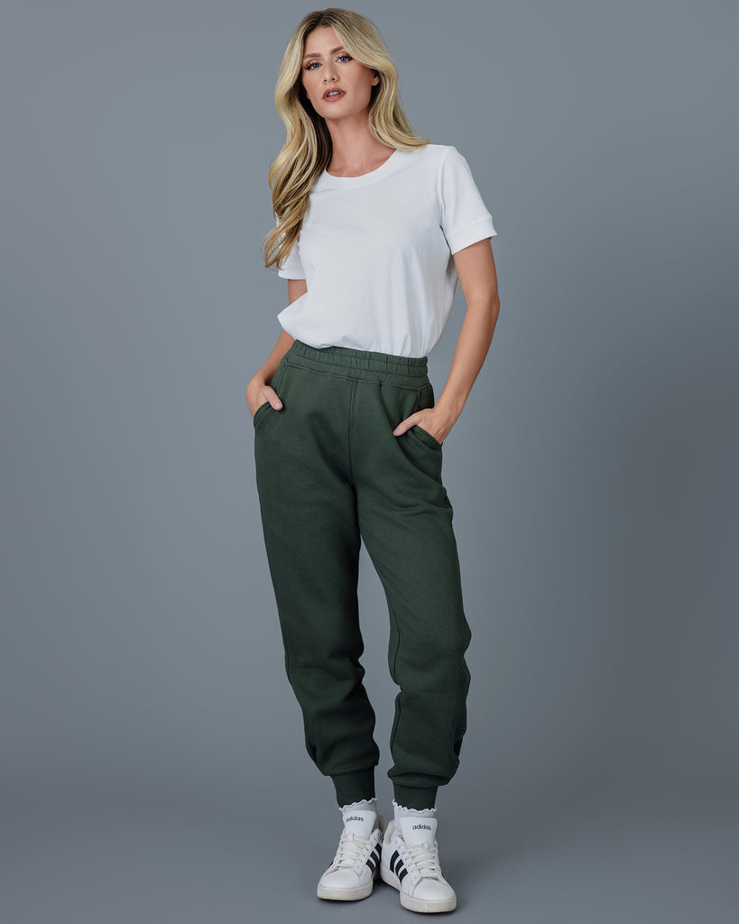 Woman in green jogger sweatpants