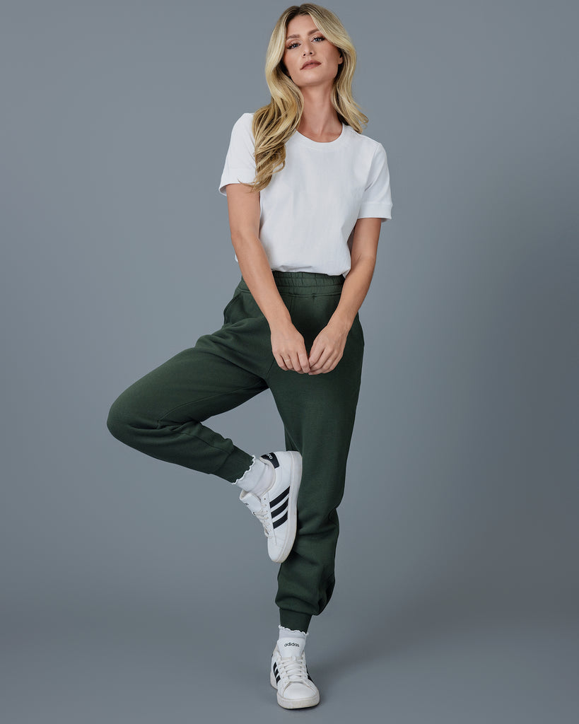 Woman in green jogger sweatpants