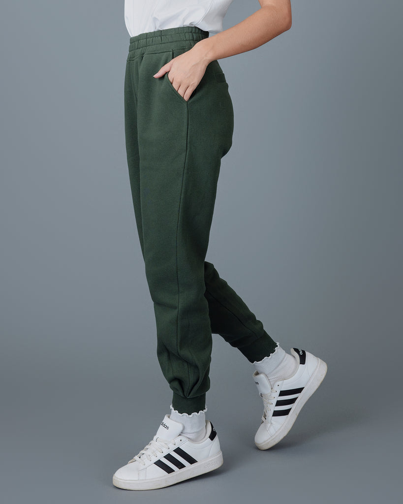 Woman in green jogger sweatpants