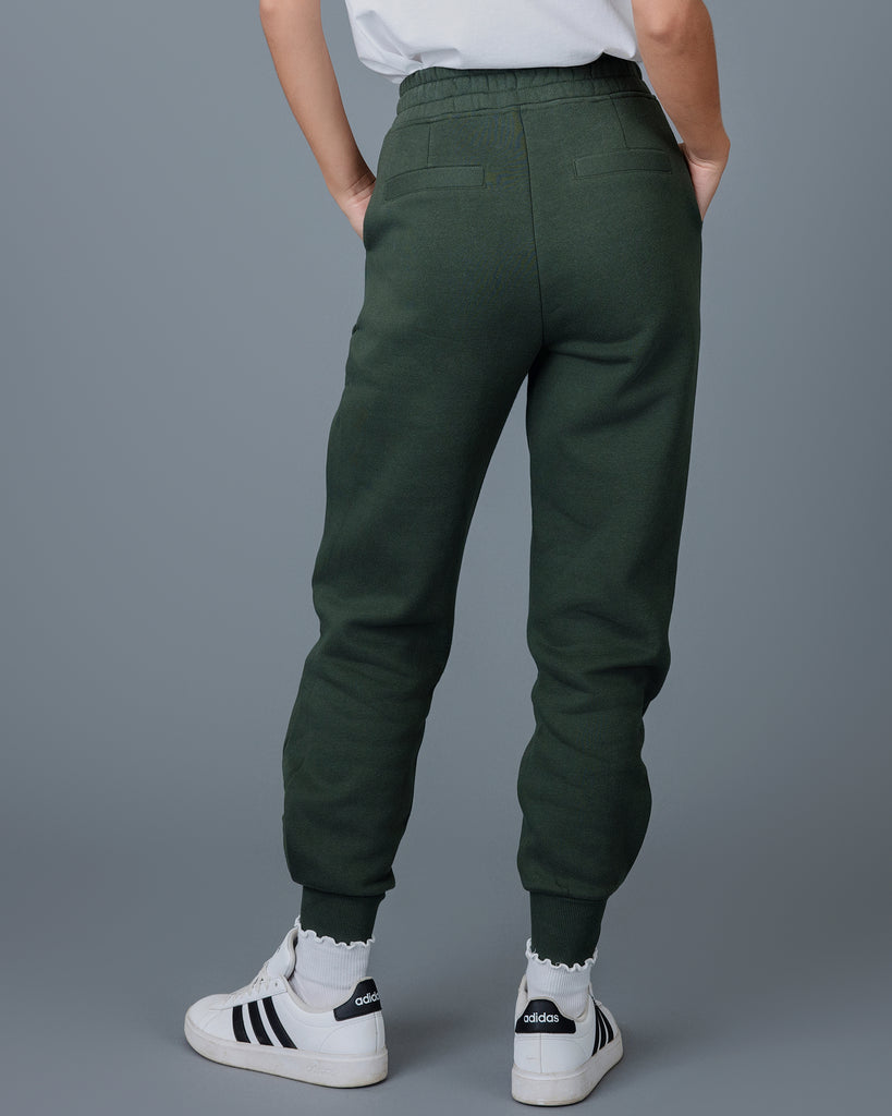 Woman in green jogger sweatpants