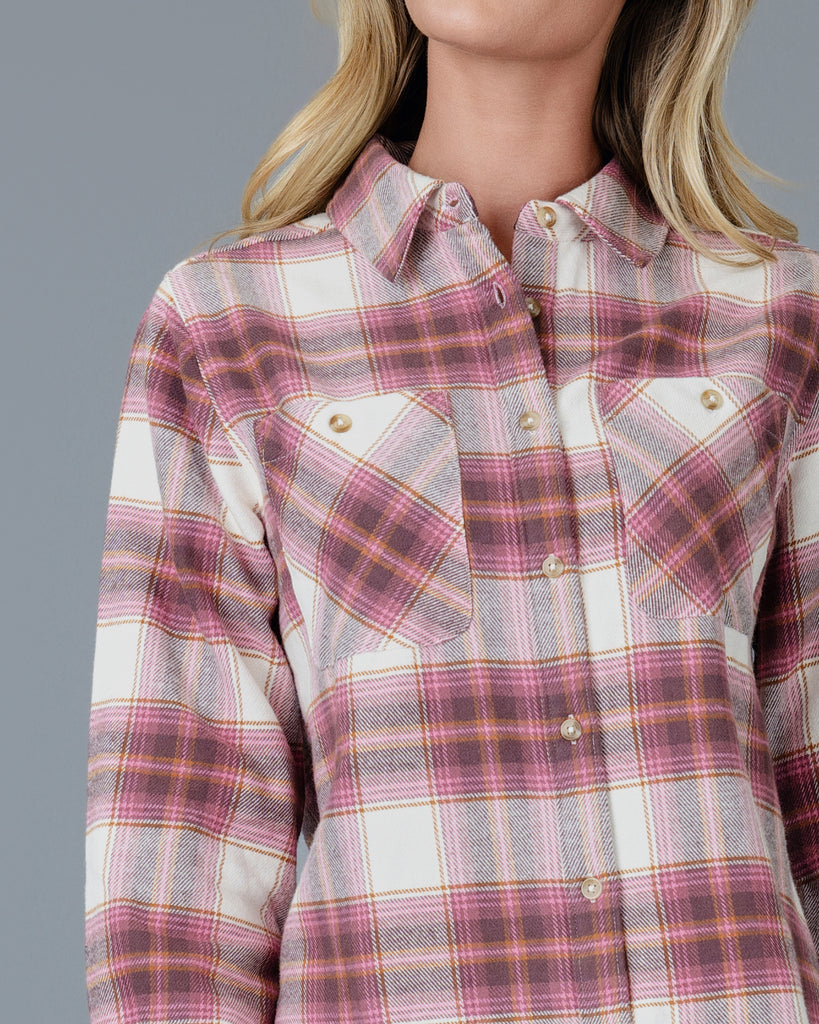 Woman in a pink plaid buttondown top