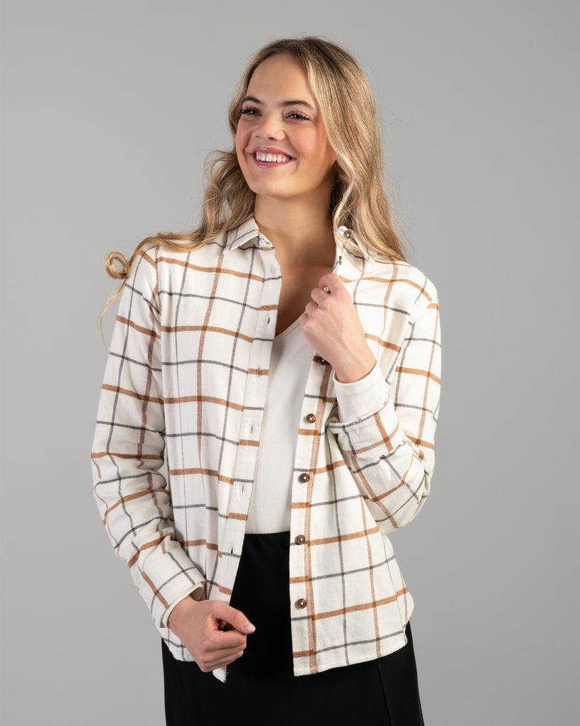 Woman in a beige plaid buttondown