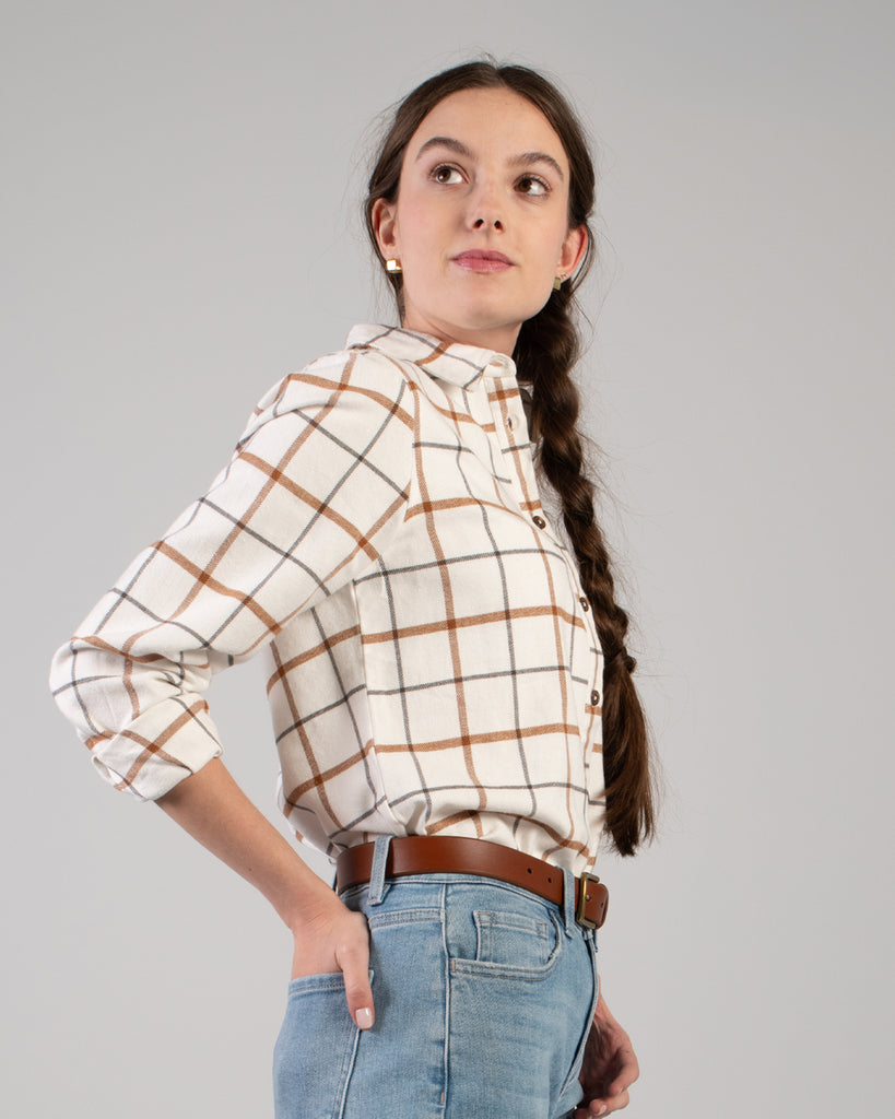 Woman in a beige plaid buttondown