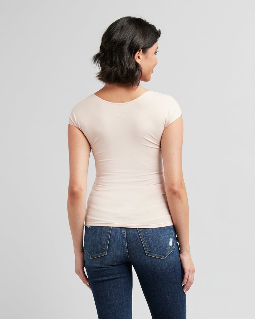 Woman in a short sleeve, fitted, basic tee