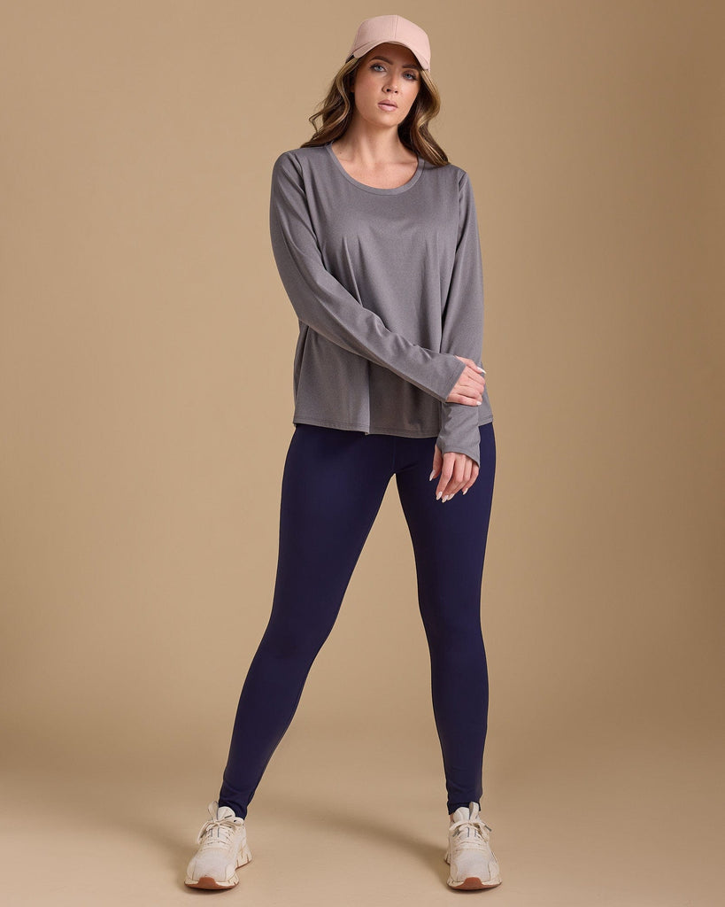 Woman in a grey long sleeve tshirt